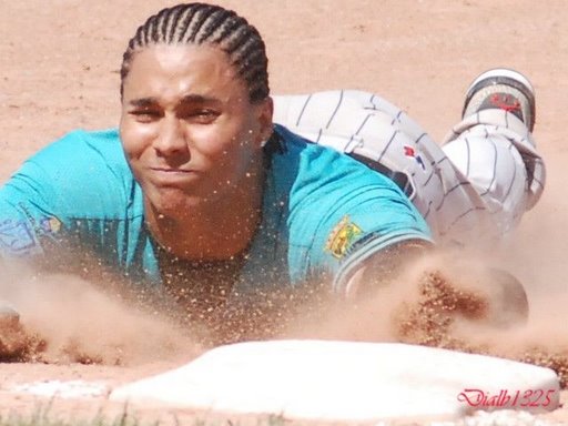 Tenerife Marlins player slides in a game versus Barcelona