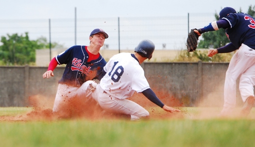 Anthony Piquet holds on at second base, as Savigy tries to break up Double Play