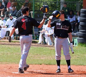 Matt Vance greets Philipp Howard after one of his four homeruns